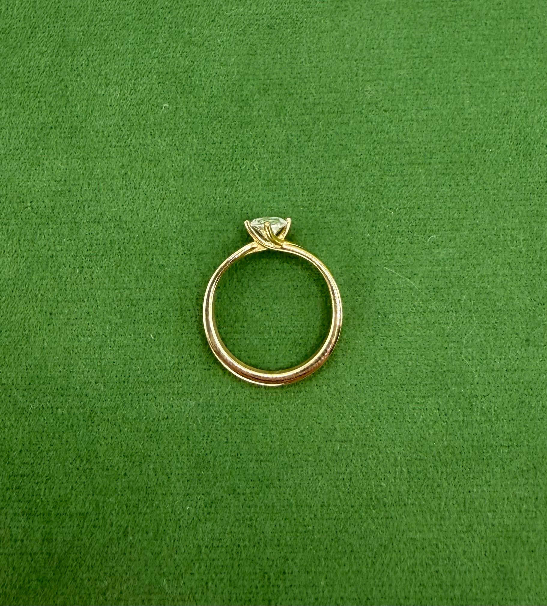 Offset Twist Oval Solitaire Engagement Ring – 14k Gold