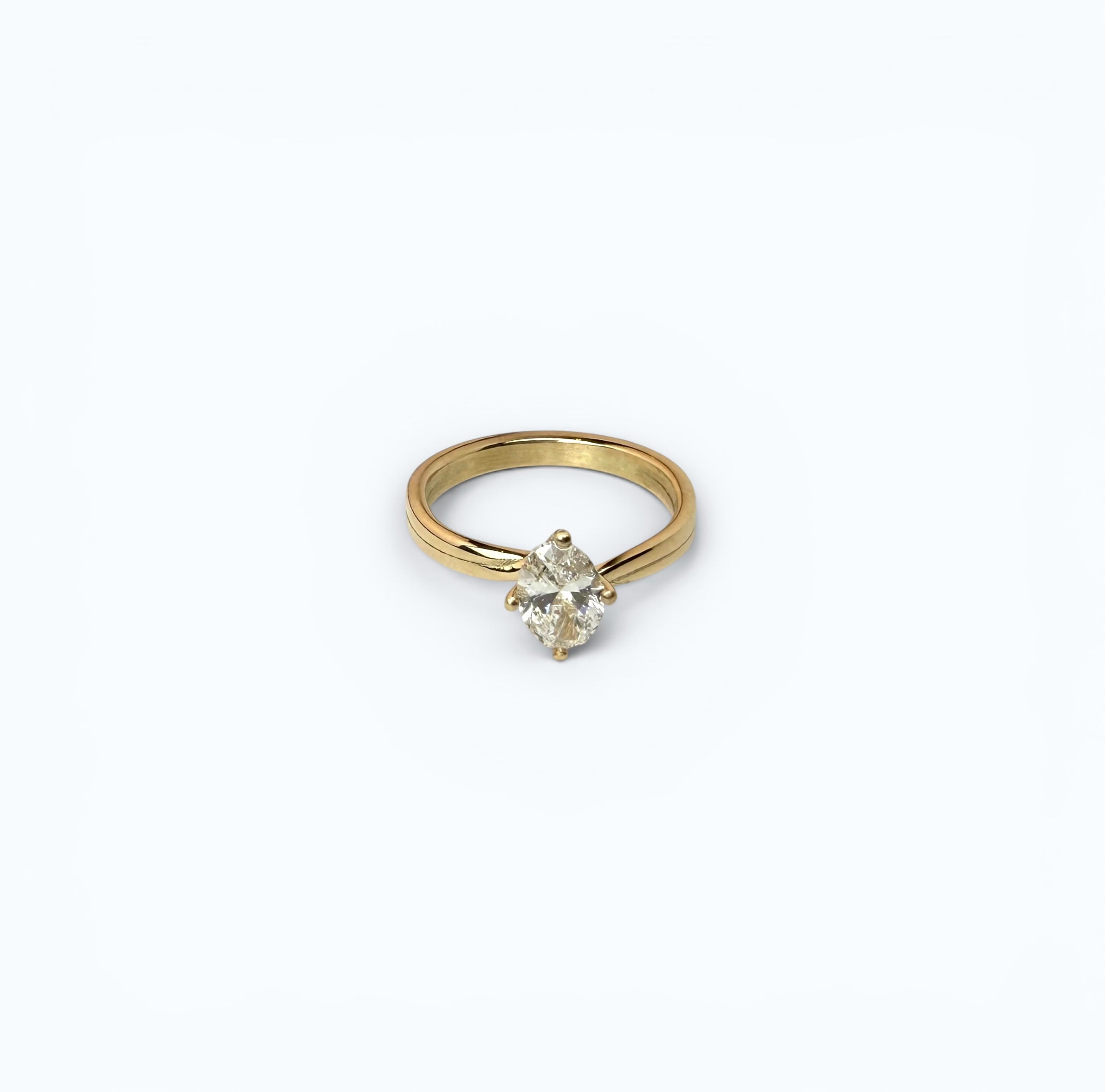 Offset Twist Oval Solitaire Engagement Ring – 14k Gold