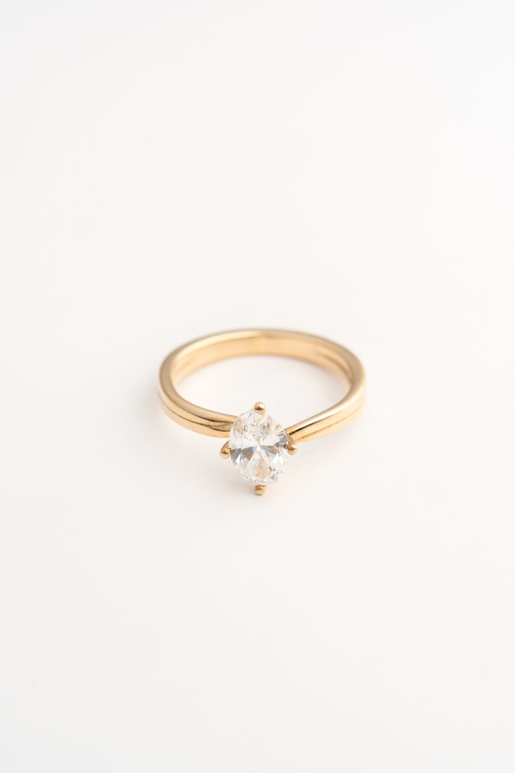 Offset Twist Oval Solitaire Engagement Ring – 14k Gold