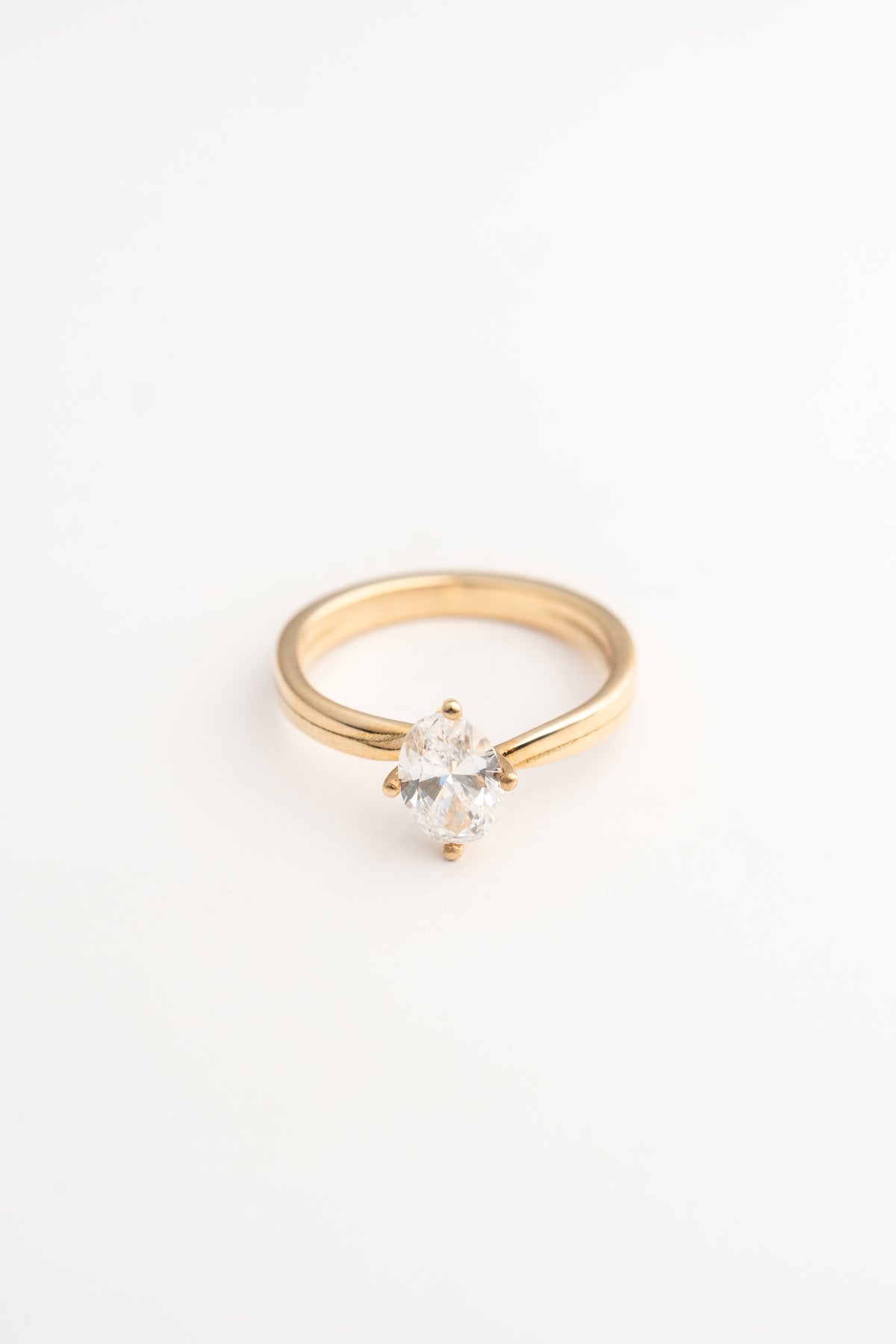 Offset Twist Oval Solitaire Engagement Ring – 14k Gold