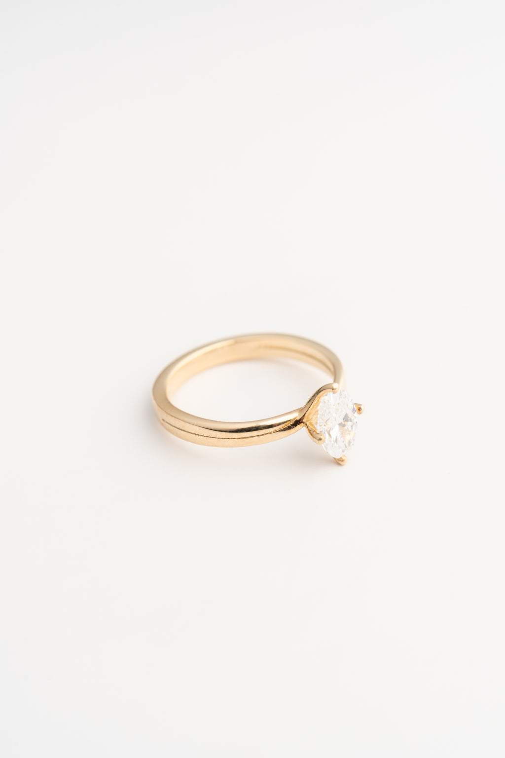 Offset Twist Oval Solitaire Engagement Ring – 14k Gold